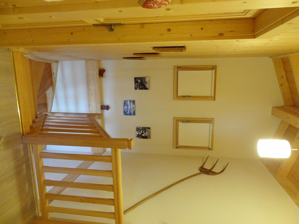 Chalet Chanterelle stairway from upper floor landing to living area